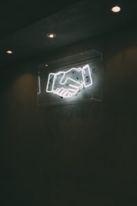 Picture is of a sign of a handshake - Representing the ideal client