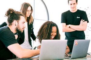 The photo is of a team of people returning to work