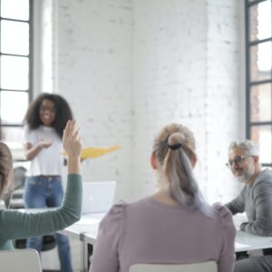 This is a photo of business owners looking happy because they have implemented 10 Proven Strategies for Business Owners to Wrap Up the Year on a High Note