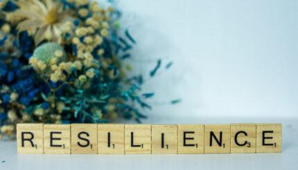 This is a photo of the word Resilience in scrabble letters to show how to Building a Resilient Mindset: How To Overcome Challenges in Business