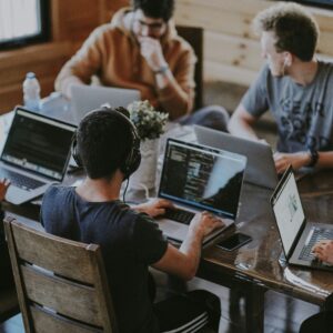 This is a picture of a happy team to demonstrate reating a Culture of Growth – How to Empower Your Team